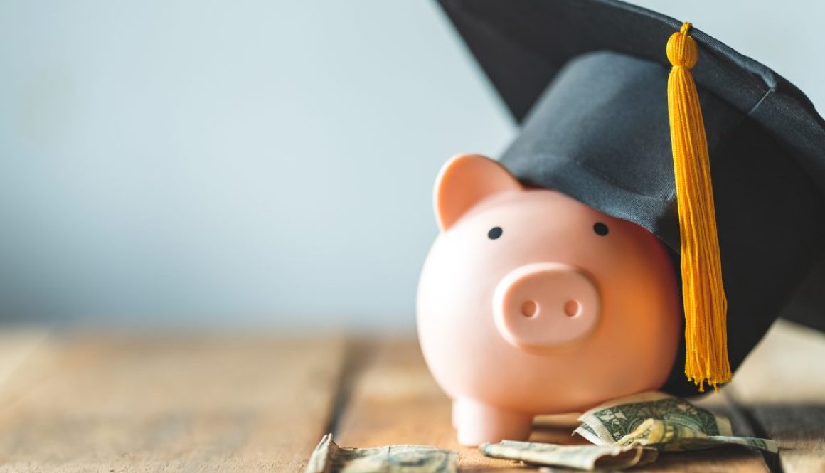 piggy bank With Graduation Cap on old wood,Money saving concept.