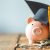 piggy bank With Graduation Cap on old wood,Money saving concept.