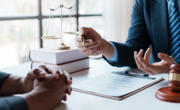 Lawyer and client sign variou financial legal contract to mediate with the legal execution department and make appointment for client to mediate debt settlement agreement. Lawyer and client sign variou financial legal contract to mediate with the legal execution department and make appointment for client to mediate debt settlement agreement.