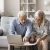 Two-seniors-reviewing-bills-and-debt-